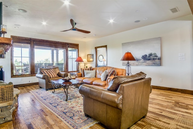 1633 Scenic Dr Unit 201, Graford, TX 76449 - living area with wood finished floors, ceiling fan, baseboards, and recessed lighting