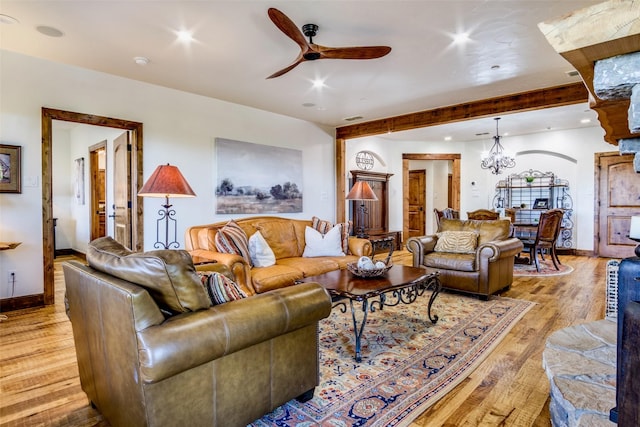 1633 Scenic Dr Unit 201, Graford, TX 76449 - living room with light wood-style floors, a ceiling fan, a chandelier, baseboards, and recessed lighting
