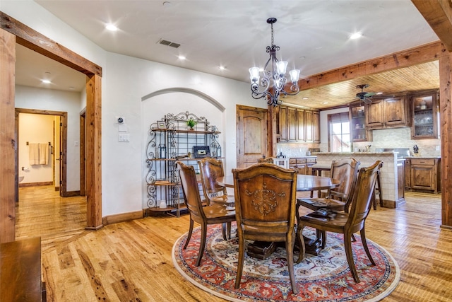 1633 Scenic Dr Unit 201, Graford, TX 76449 - dining space with light wood-type flooring, a chandelier, baseboards, recessed lighting, and beamed ceiling