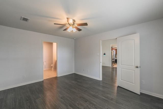 3001 Rocking Hills Trl, Forney, TX 75126 - unfurnished room with a ceiling fan, dark wood-style flooring, and baseboards