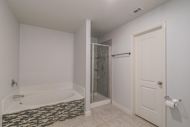3001 Rocking Hills Trl, Forney, TX 75126 - full bathroom featuring tile patterned floors, a shower stall, a bath, and baseboards