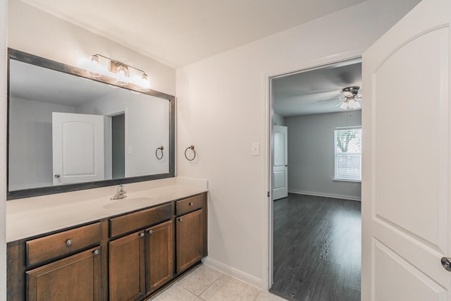 3001 Rocking Hills Trl, Forney, TX 75126 - bathroom with a ceiling fan, baseboards, and vanity