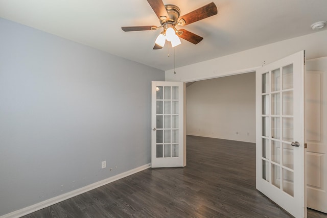 3001 Rocking Hills Trl, Forney, TX 75126 - unfurnished room featuring french doors, dark wood-style floors, a smoke detector, ceiling fan, and baseboards