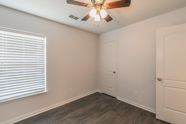 3001 Rocking Hills Trl, Forney, TX 75126 - empty room with dark wood-style floors, baseboards, and ceiling fan