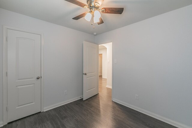 3001 Rocking Hills Trl, Forney, TX 75126 - spare room featuring wood finished floors, baseboards, a ceiling fan, and arched walkways