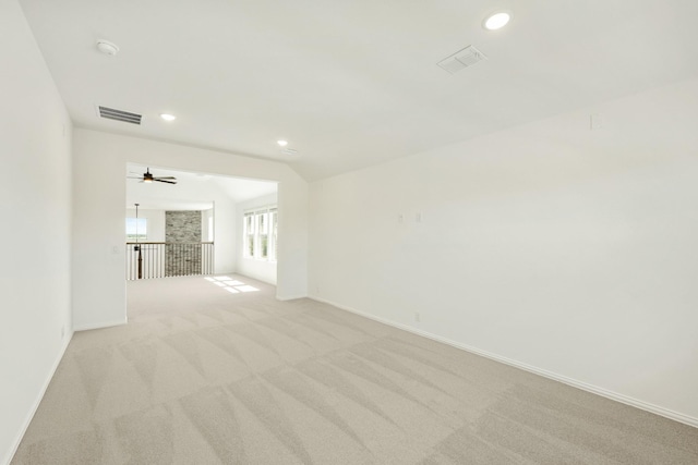1024 Emerald Trace Dr, Justin, TX 76247 - spare room featuring light colored carpet, recessed lighting, baseboards, ceiling fan, and a smoke detector