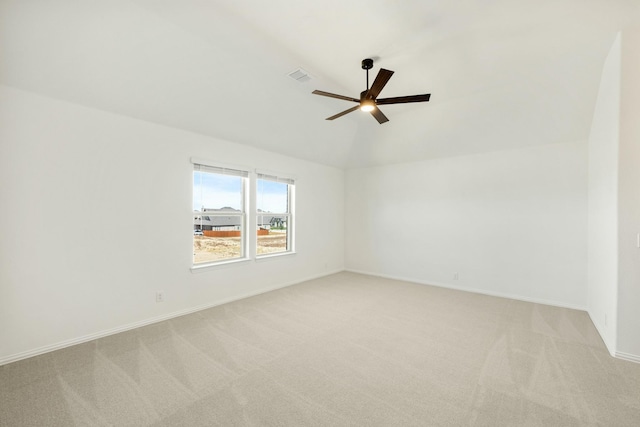 1024 Emerald Trace Dr, Justin, TX 76247 - unfurnished room with light carpet, ceiling fan, vaulted ceiling, and baseboards