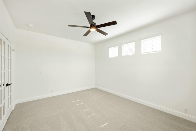 1024 Emerald Trace Dr, Justin, TX 76247 - unfurnished room featuring ceiling fan, baseboards, light colored carpet, and a smoke detector