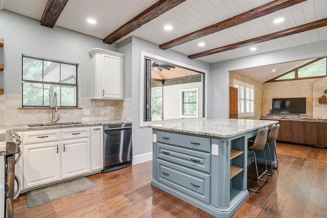 132 S Briaroaks Rd, Burleson, TX 76028 - kitchen with a sink, appliances with stainless steel finishes, white cabinets, open shelves, and open floor plan