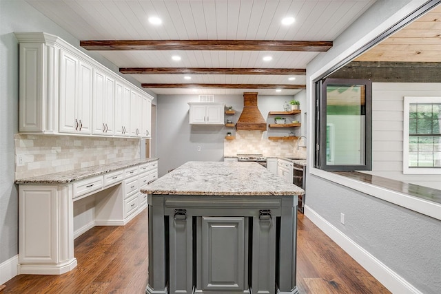 132 S Briaroaks Rd, Burleson, TX 76028 - kitchen featuring custom exhaust hood, dark wood-type flooring, backsplash, gray cabinets, and wooden ceiling