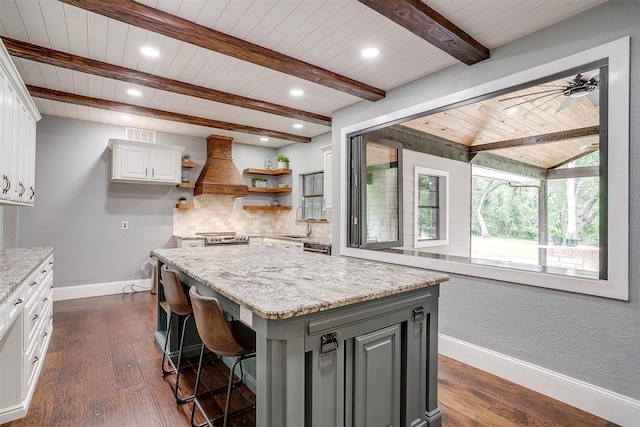 132 S Briaroaks Rd, Burleson, TX 76028 - kitchen with premium range hood, open shelves, a sink, wooden ceiling, and baseboards