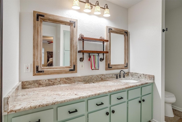 132 S Briaroaks Rd, Burleson, TX 76028 - bathroom featuring vanity and toilet