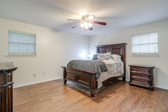 132 S Briaroaks Rd, Burleson, TX 76028 - bedroom with wood finished floors, baseboards, and ceiling fan