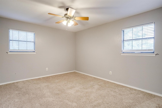 132 S Briaroaks Rd, Burleson, TX 76028 - carpeted spare room featuring a ceiling fan and baseboards