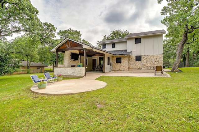 132 S Briaroaks Rd, Burleson, TX 76028 - rear view of property featuring stone siding, a patio area, board and batten siding, and ceiling fan