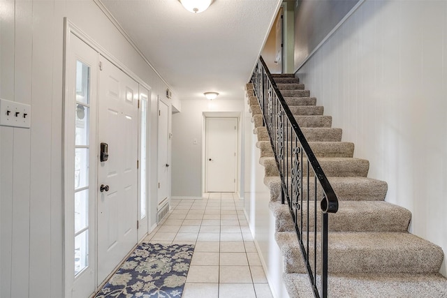 132 S Briaroaks Rd, Burleson, TX 76028 - entryway with stairway and light tile patterned floors