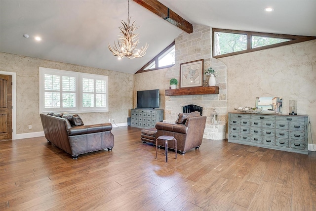 132 S Briaroaks Rd, Burleson, TX 76028 - living room featuring wood finished floors, a chandelier, a fireplace, and recessed lighting