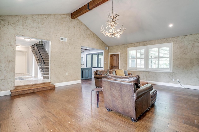132 S Briaroaks Rd, Burleson, TX 76028 - living room with hardwood / wood-style floors, baseboards, a chandelier, beam ceiling, and stairway
