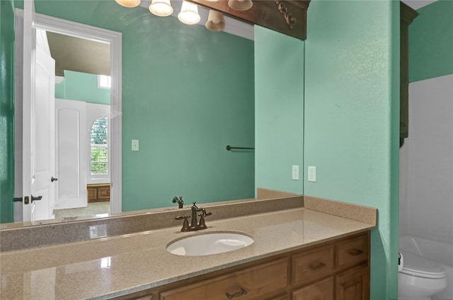6805 Castle Pines Ct, Tyler, TX 75703 - bathroom with toilet and vanity