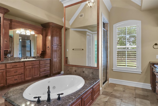 6805 Castle Pines Ct, Tyler, TX 75703 - full bath with a shower stall, a jetted tub, baseboards, and vanity