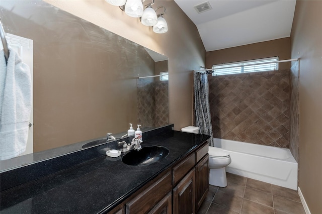 112 Glen Ridge Dr, Murphy, TX 75094 - bathroom featuring toilet, shower / bath combo with shower curtain, vanity, vaulted ceiling, and tile patterned flooring