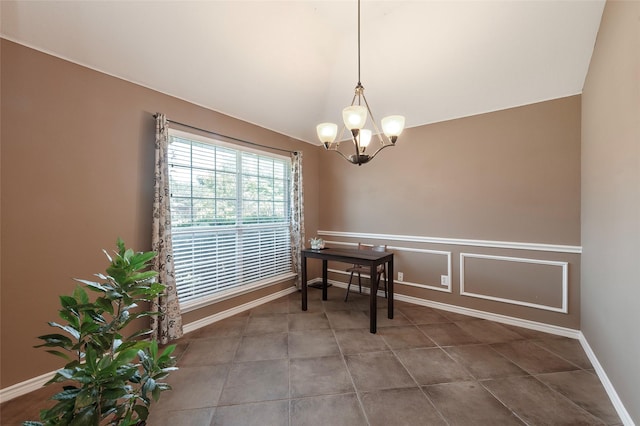 112 Glen Ridge Dr, Murphy, TX 75094 - tiled dining room with vaulted ceiling, a chandelier, and baseboards
