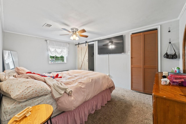685 S First Ave, Stephenville, TX 76401 - carpeted bedroom featuring crown molding, a barn door, and a ceiling fan
