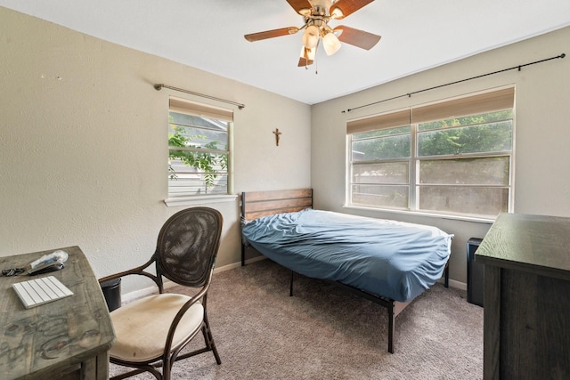 685 S First Ave, Stephenville, TX 76401 - bedroom featuring carpet flooring, baseboards, and a ceiling fan