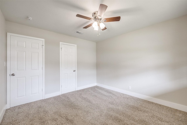 324 Deer Creek Rd, Everman, TX 76140 - unfurnished bedroom with carpet flooring, baseboards, and ceiling fan