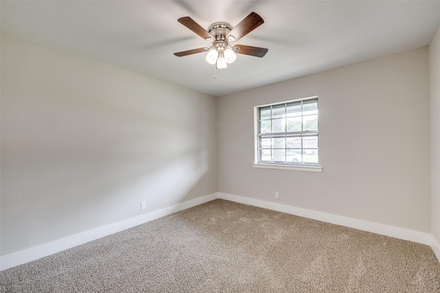 324 Deer Creek Rd, Everman, TX 76140 - spare room featuring carpet, ceiling fan, and baseboards