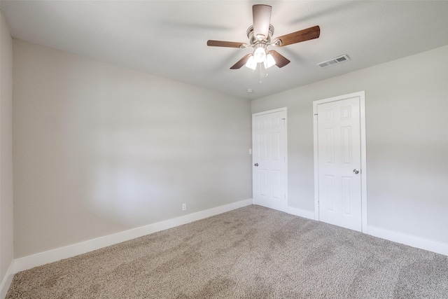324 Deer Creek Rd, Everman, TX 76140 - unfurnished bedroom with carpet floors, baseboards, and a ceiling fan