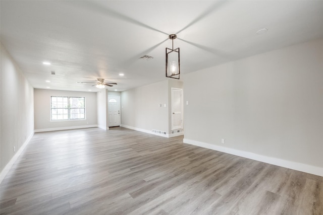 324 Deer Creek Rd, Everman, TX 76140 - unfurnished room featuring light wood-style flooring, baseboards, recessed lighting, and ceiling fan