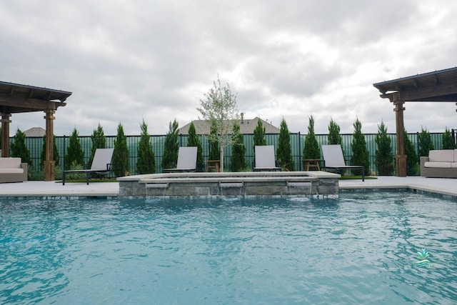 5924 Carmona Trl, Fort Worth, TX 76123 - view of pool featuring a fenced backyard and a pool with connected hot tub
