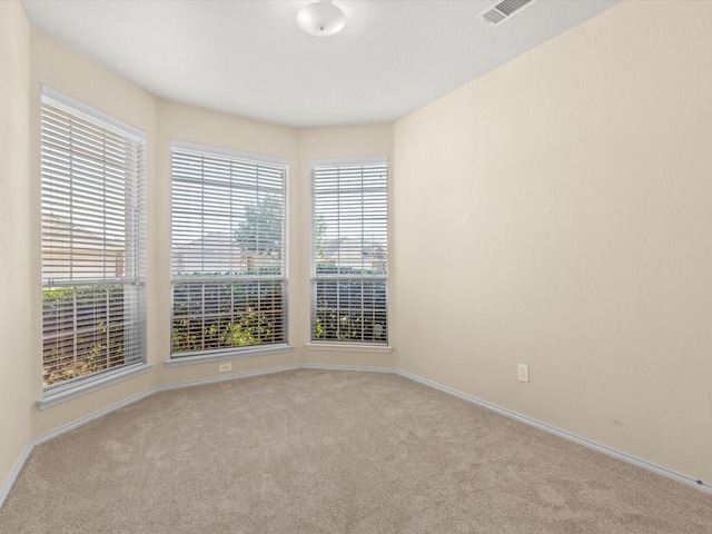 7404 Sunray Dr, Fort Worth, TX 76120 - spare room featuring carpet and baseboards