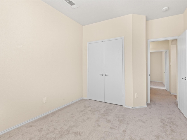7404 Sunray Dr, Fort Worth, TX 76120 - unfurnished bedroom with carpet floors, a closet, and baseboards