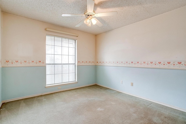 3941 Devonaire Dr, Fort Worth, TX 76008 - empty room featuring a ceiling fan, a textured ceiling, carpet floors, and baseboards