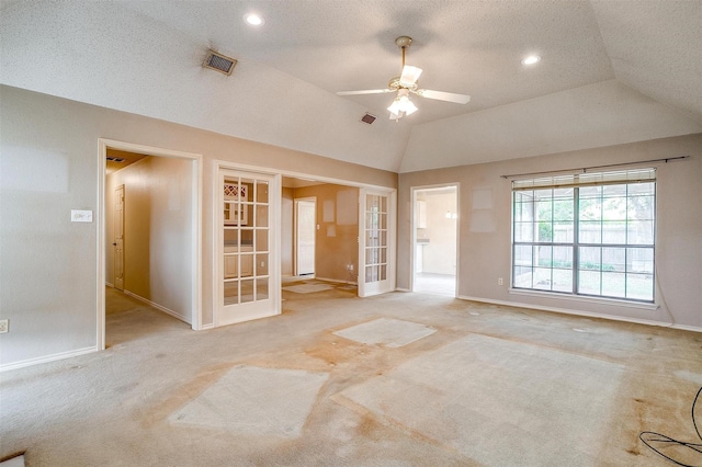 3941 Devonaire Dr, Fort Worth, TX 76008 - carpeted spare room with french doors, baseboards, ceiling fan, vaulted ceiling, and recessed lighting