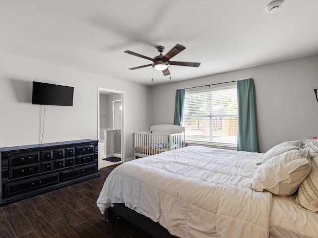 1429 Trading Post Dr, Fort Worth, TX 76131 - bedroom with wood finished floors, a ceiling fan, and connected bathroom