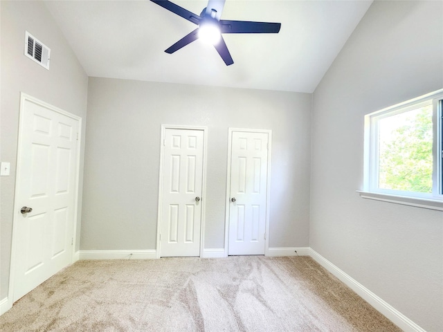 227 Rodeo Dr, Keller, TX 76248 - unfurnished bedroom with carpet, baseboards, ceiling fan, multiple closets, and lofted ceiling