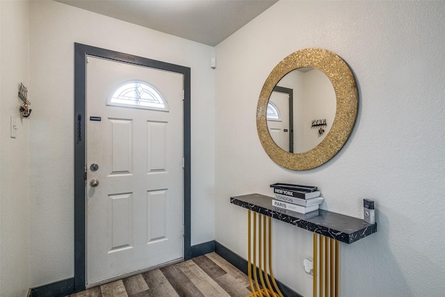 703 Moss Glen Trl, Arlington, TX 76002 - entryway with dark wood-style flooring and baseboards