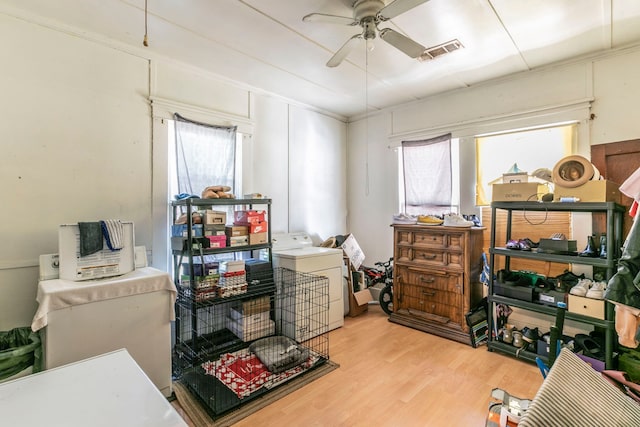 1735 Marburg St, Dallas, TX 75215 - storage room with washer / dryer and ceiling fan