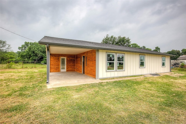2189 Rs County Road 3150, Emory, TX 75440 - view of home's exterior with a patio area, board and batten siding, and a carport