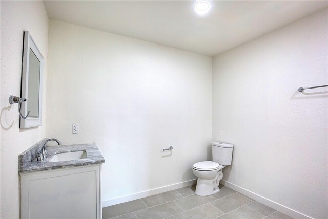 2189 Rs County Road 3150, Emory, TX 75440 - half bath featuring toilet, vanity, tile patterned flooring, and baseboards