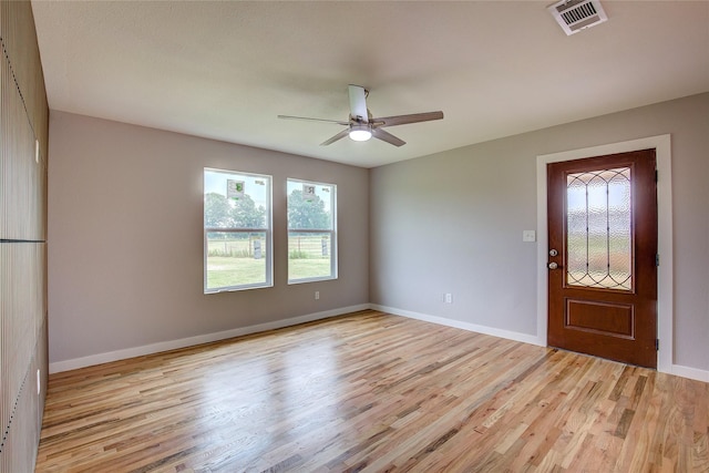 2189 Rs County Road 3150, Emory, TX 75440 - foyer featuring plenty of natural light, light wood-style flooring, ceiling fan, and baseboards