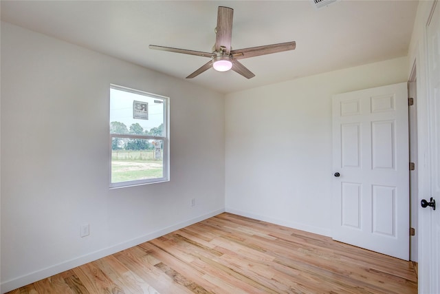 2189 Rs County Road 3150, Emory, TX 75440 - empty room with ceiling fan, light wood finished floors, and baseboards