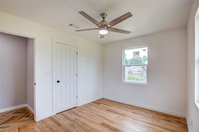 2189 Rs County Road 3150, Emory, TX 75440 - unfurnished bedroom featuring baseboards, light wood-style flooring, and a ceiling fan