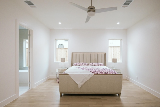 2935 Lovers Ln, University Park, TX 75225 - bedroom featuring light wood-type flooring, recessed lighting, baseboards, and multiple windows