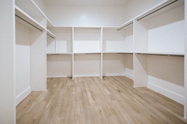 2935 Lovers Ln, University Park, TX 75225 - spacious closet featuring light wood finished floors
