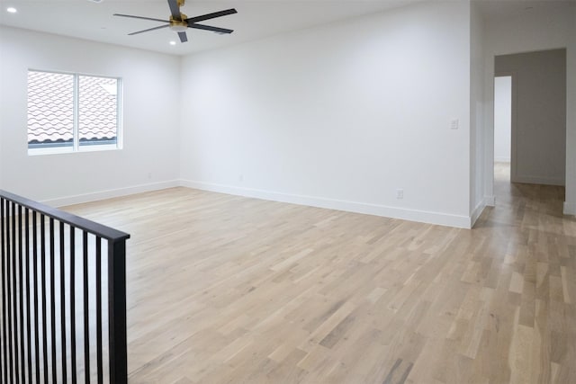 2935 Lovers Ln, University Park, TX 75225 - unfurnished room featuring a ceiling fan, recessed lighting, light wood finished floors, and baseboards
