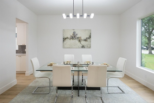 2935 Lovers Ln, University Park, TX 75225 - dining space featuring wood finished floors and baseboards